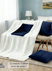 2 in 1 White blanket with a navy blue cushion in a bedroom setting